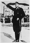 Portrait of Slavko Kvaternik, Commander in Chief of the military of the Independent State of Croatia, saluting during an outdoor ceremony.