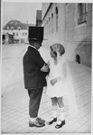 Suse Grunbaum and her cousin, Chaim Dannhauser, pose in a mock wedding ceremony.