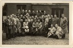 Group portrait of the employees of the leather workshop in the Lodz ghetto.