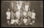 Group portrait of children dressed in Purim costumes.
