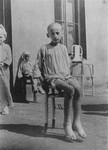 Portrait of a starving child in a hospital in the Warsaw ghetto.