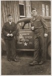 Michel Schadur (left) poses with another member of UNRRA Team 180 next to his official car.
