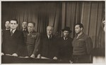 Group portrait of DP leaders on the dias at a conference sponsored by the Central Committee of the Liberated Jews in the U.S.
