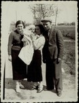 Standing from right to left: Yehudah Gaikowski, his wife, Beila Portnoy Gaikowski holding their son Yitzhak'l and Hannah Dubczanski.