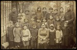 The first grade class photo of  the first coeductional Hebrew day school in Eisiskes.