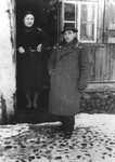 Members of the Shlachter family outside their home in Dabrowa Bialostocka.