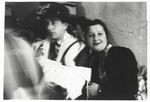 Itzhak Gendelman serves as the godfather at the circumcision of Arele Werkel, the son of Taibel and Yehiel Greenberg at the Ebelsberg displaced persons camp near Linz, Austria.