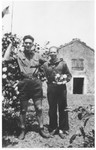 Carl Roman (right) poses in uniform with the one other Jew who was living in hiding in the Compagnons de France Vichy youth camp in Agde.