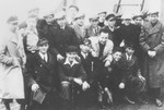 Group portrait of German Jewish refugee youth on the deck of the SS Oronsay while en route from England to Australia.