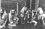 German propaganda photo of Jews at prayer in the Lodz ghetto.