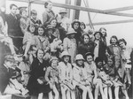 Group portrait of Jewish refugee children from Germany and London, on the deck of the MS Batory as the ship arrives in Melbourne.