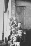 Jewish refugees from Germany and Austria pose on the stoop of a barracks in the Kitchener refugee camp in Richborough (Kent), England.