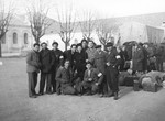 Group portrait of Jewish DPs who are about to leave Enns on the Bricha escape route.