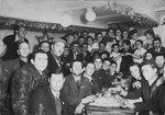 Young people gather at a Hanukkah party in the Pocking displaced persons' camp.