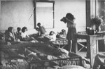 Girls living in a dormitory at the Mehoncourt children's home get up in the morning.