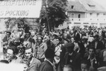 Jewish displaced persons and former prisoners march to the dedication of a memorial at the site of the Pocking concentration camp.