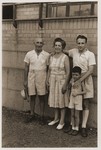 The Goldstaub family poses for a photograph with Harry Fiedler.