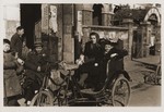 Austrian Jewish refugees Camilla Goldstaub and Harry Fiedler sit in a pedicab on Tongshan Road.