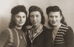 Close-up portrait of three Jewish teenage girls in the Bad Reichenall displaced persons camp.