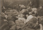 Jewish DPs who have fled from Poland, sleep in the box car of a train while on their way to the west.