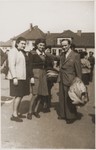 Hadassah Bimko (left) and Josef Rosensaft (right) pose with one of the teenage orphans who is about to leave the Bergen-Belsen displaced persons' camp on the first authorized children's transport to Palestine.