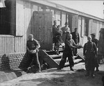 Jewish prisoners in Plaszow unload bread into the Madritch factory.