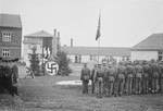 Commandant Amon Goeth delivers a speech to the SS staff in the Plaszow concentration camp.