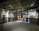 View of a casting taken of the gate to the main camp at Auschwitz with the sign "Arbeit Macht Frei" [Work Makes One Free] that is displayed on the third floor of the permanent exhibition in the U.S.