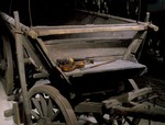 Detail of the Romani wagon and violin displayed on the fourth floor of the permanent exhibition at the U.S.