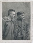 Jan Kostanski (right) poses with Wladek Cykiert in the Warsaw ghetto.