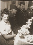 Hinda Chilewicz attends a Passover seder at the home of Mary Ganzweich in Bayreuth, 1946.