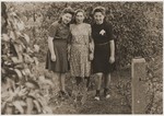 A Jewish mother poses with her two daughters at the Fuerth displaced persons camp.