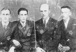 Members of the Jakubowicz family weari Jewish badges, in the Wielun ghetto.
