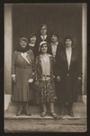 A group of Czech Jewish women pose together in a doorway.