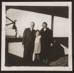 The Mansbacher family on route to Shanghai on board the Norwegian freighter "Triton."  From left to right are Julius, Hannelore, and Kaethe.