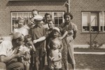 Jewish families vacation together in Denmark.  

Among those pictured are Milan, Leo, and Gus Goldberger with their mother, Helen Goldberger.