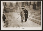 Barrister Carl Bertil Henriques (left) walks outside with a colleague.