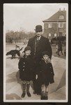 Cantor Eugene Goldberger poses with his sons Milan and Leo, shortly after their move to Copenhagen.