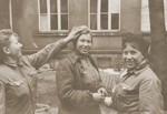 Three female DPs in Dillenburg after the liberation of the area by U.S.