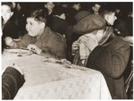 Austrian refugee children who arrived in England with the second Kindertransport, eat a meal at the Pakefield holiday camp in Suffolk.