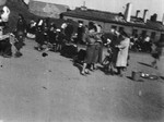 Clandestine photograph of civilian women and children from Warsaw transported to Ravensbrueck after the collapse of the Warsaw Uprising.