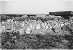 Makeshift tombstones mark the mass grave of Jewish victims in the Warsaw ghetto.