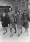 Hanna Rawicz walks along a street in Rome with friends during the period before she went into hiding in a convent.