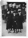 The three Wassermann sisters pose on a commercial street in Würzburg.