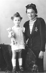 Helena Husserlova, wearing a Jewish badge, poses with her daughter Zdenka shortly before their deportation to Theresienstadt.