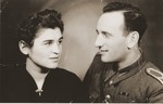 Studio portrait of a Jewish DP couple on their wedding day in Lublin, Poland.