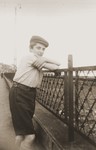 Chaim Wilshanski, a friend who was accompanying the donor on a bicycle trip, poses on a bridge over the Main River.