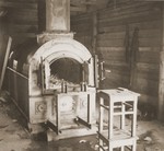 View of the crematorium oven at Bergen-Belsen. 
 
The original caption reads "The furnace in the crematorium where the Germans burned the bodies
of their thousands of victims."