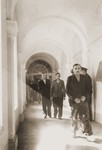 The Polish prisoner Siegmunt Swider (b. May 6, 1906) is led down the hall of the county courthouse in Rzeszow.