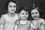 Studio portrait of three Jewish children in Cologne, Germany.
